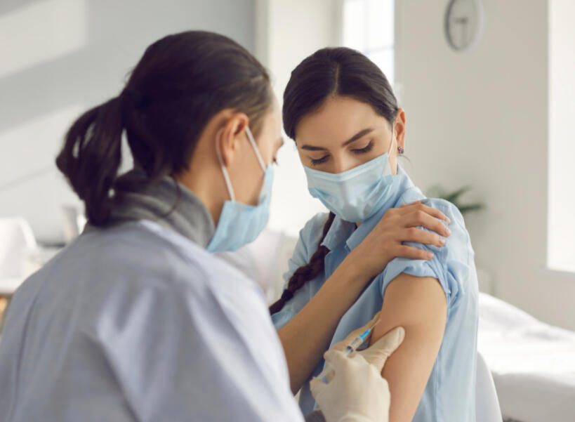 Pharmacist consulting her patient